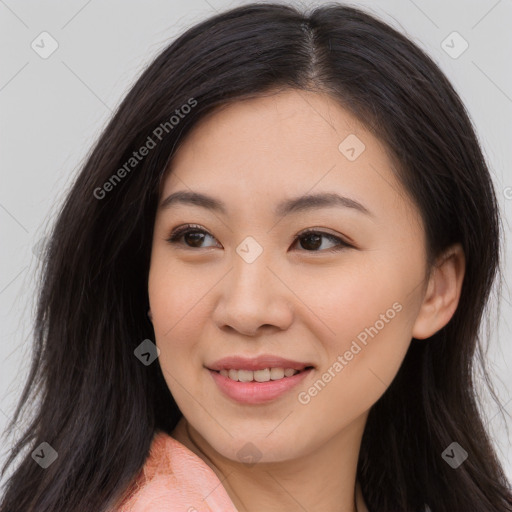 Joyful asian young-adult female with long  brown hair and brown eyes