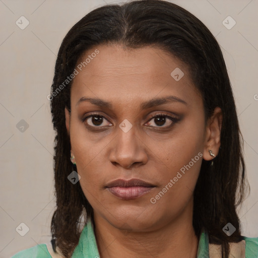 Joyful latino young-adult female with medium  brown hair and brown eyes