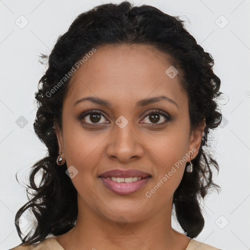 Joyful black young-adult female with long  brown hair and brown eyes