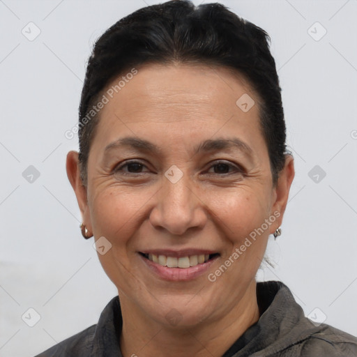 Joyful white adult female with short  brown hair and brown eyes