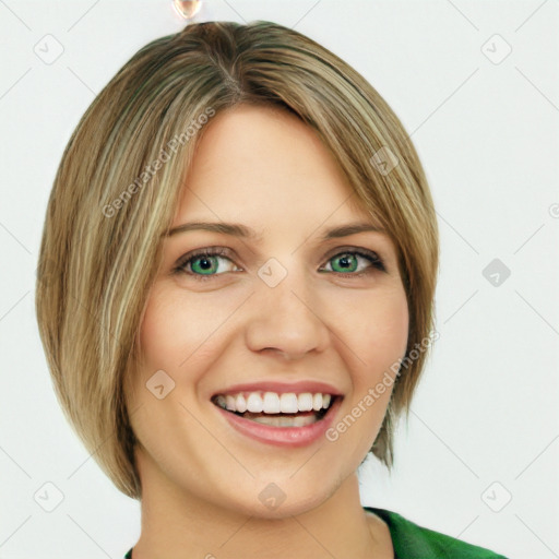 Joyful white young-adult female with medium  brown hair and green eyes