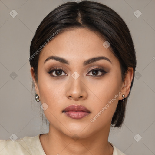 Neutral asian young-adult female with medium  brown hair and brown eyes