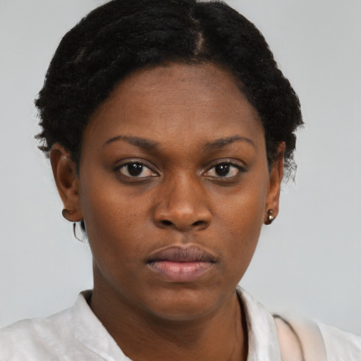 Neutral black young-adult female with short  brown hair and brown eyes
