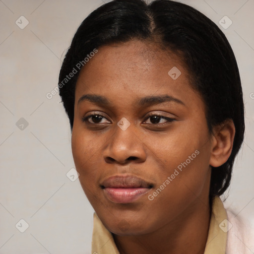 Joyful black young-adult female with medium  brown hair and brown eyes