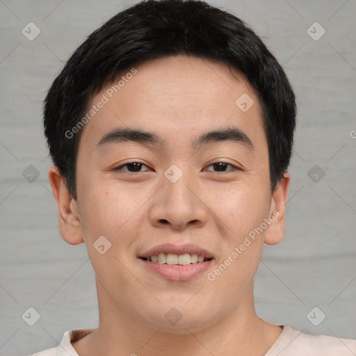 Joyful asian young-adult male with short  brown hair and brown eyes