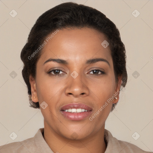 Joyful black young-adult female with short  brown hair and brown eyes