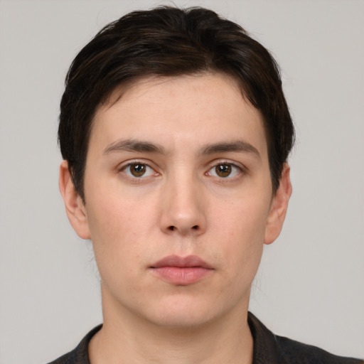 Neutral white young-adult male with short  brown hair and brown eyes