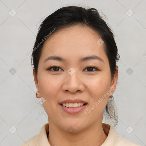 Joyful asian young-adult female with medium  brown hair and brown eyes