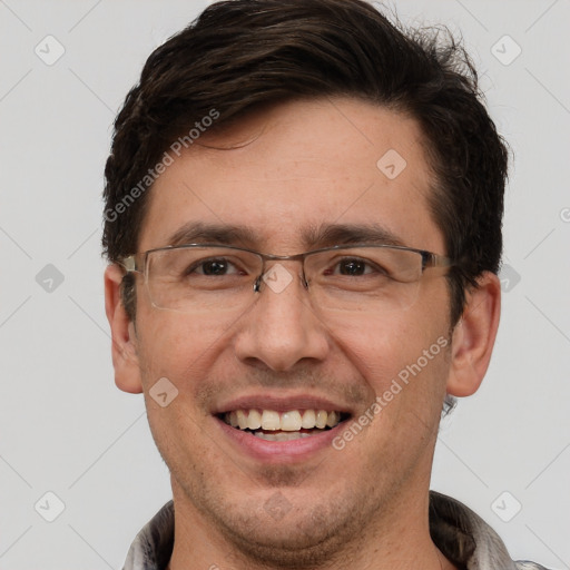 Joyful white adult male with short  brown hair and brown eyes