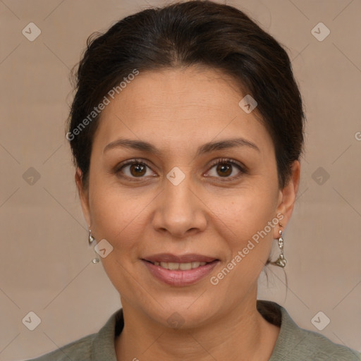 Joyful white adult female with short  brown hair and brown eyes