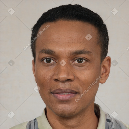 Joyful latino adult male with short  black hair and brown eyes