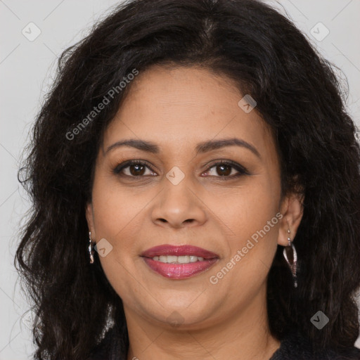 Joyful white adult female with long  brown hair and brown eyes