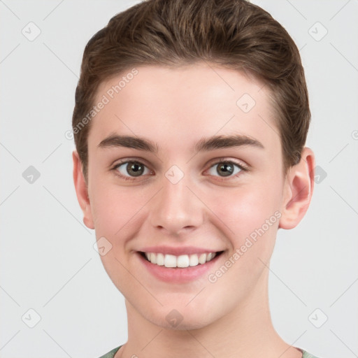 Joyful white young-adult female with short  brown hair and grey eyes