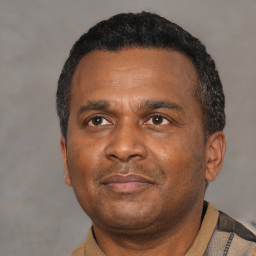 Neutral latino adult male with short  black hair and brown eyes