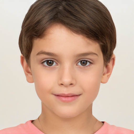 Joyful white child male with short  brown hair and brown eyes