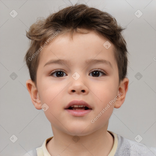 Joyful white child male with short  brown hair and brown eyes