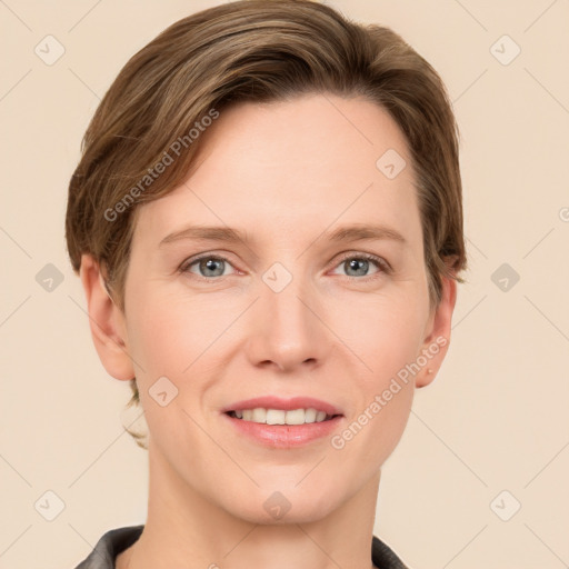 Joyful white adult female with short  brown hair and grey eyes