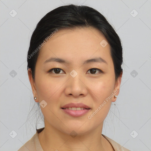 Joyful asian young-adult female with medium  brown hair and brown eyes