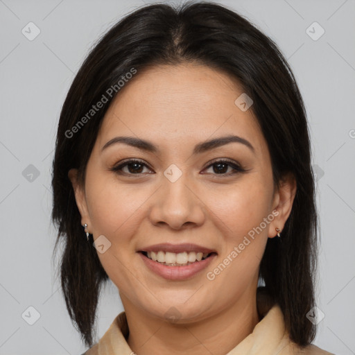 Joyful latino young-adult female with medium  brown hair and brown eyes