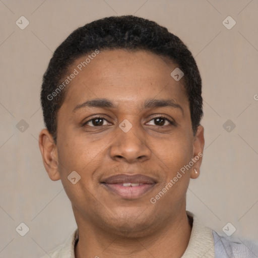 Joyful black young-adult male with short  brown hair and brown eyes