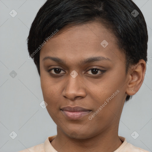 Joyful black young-adult female with short  brown hair and brown eyes