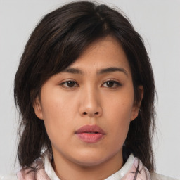 Neutral asian young-adult female with medium  brown hair and brown eyes