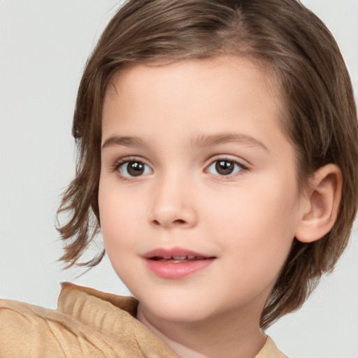 Joyful white child female with medium  brown hair and brown eyes