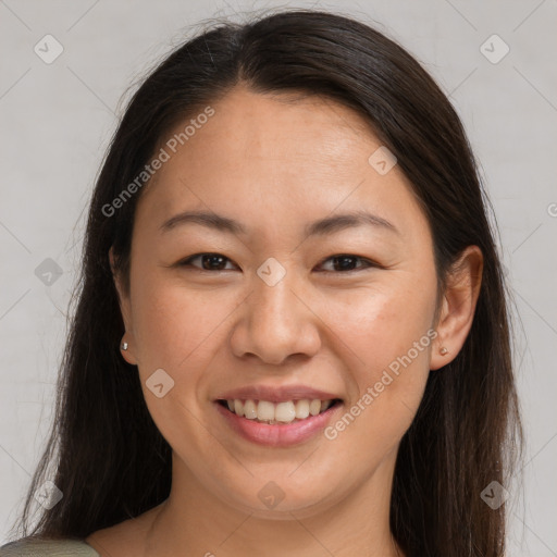 Joyful white young-adult female with long  brown hair and brown eyes