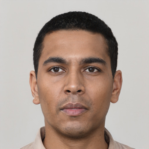 Neutral latino young-adult male with short  black hair and brown eyes