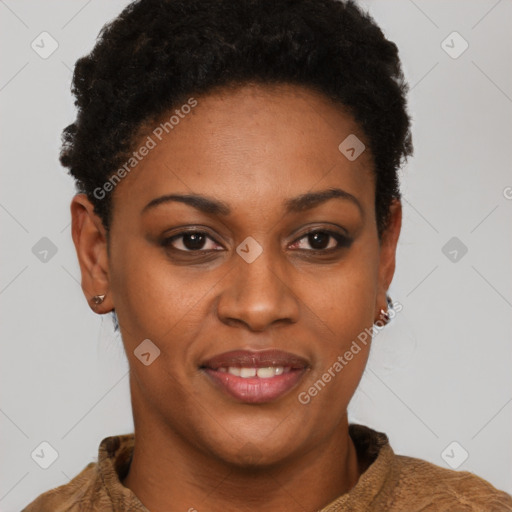 Joyful black young-adult female with short  brown hair and brown eyes