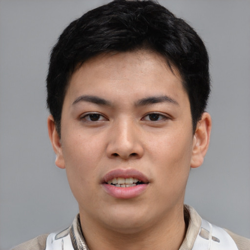 Joyful asian young-adult female with short  brown hair and brown eyes