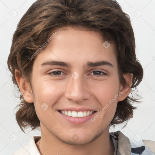 Joyful white young-adult male with medium  brown hair and brown eyes