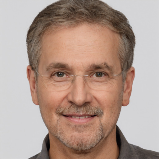 Joyful white middle-aged male with short  brown hair and brown eyes