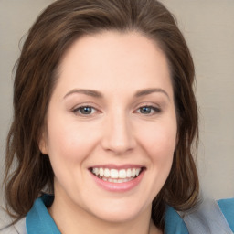 Joyful white young-adult female with medium  brown hair and blue eyes