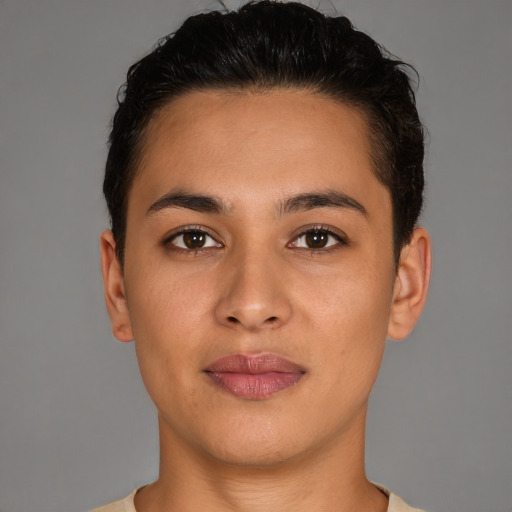 Joyful latino young-adult female with short  brown hair and brown eyes