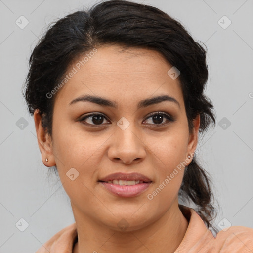 Joyful latino young-adult female with medium  brown hair and brown eyes