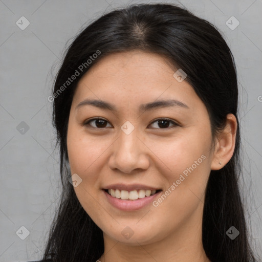 Joyful asian young-adult female with long  brown hair and brown eyes