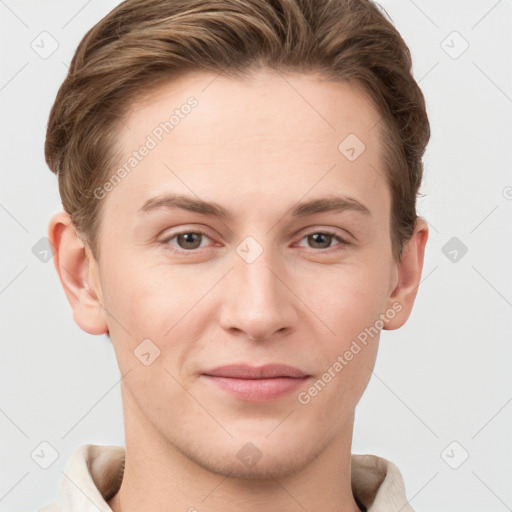 Joyful white young-adult female with short  brown hair and grey eyes