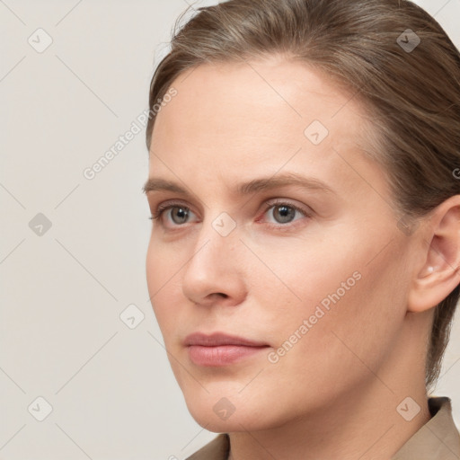 Neutral white young-adult female with short  brown hair and brown eyes