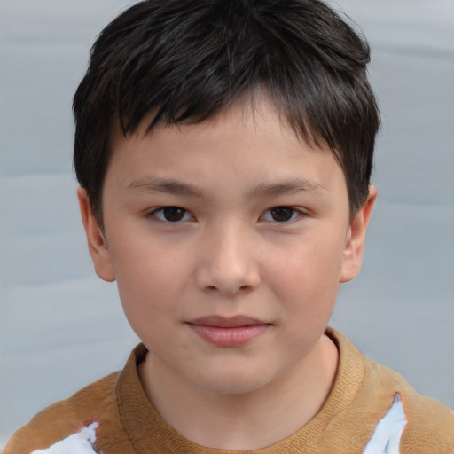 Joyful white child male with short  brown hair and brown eyes