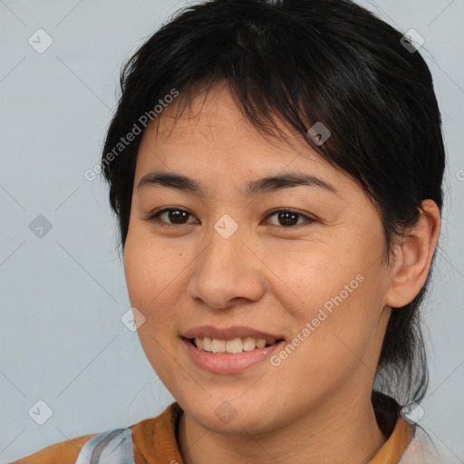 Joyful asian young-adult female with medium  brown hair and brown eyes