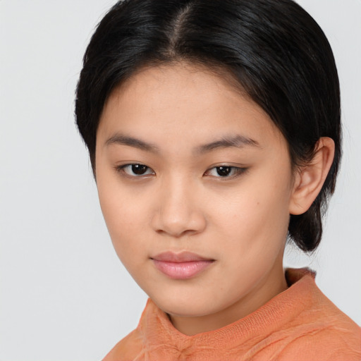 Neutral asian young-adult female with medium  black hair and brown eyes
