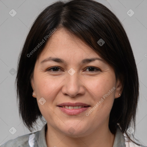 Joyful white adult female with medium  brown hair and brown eyes