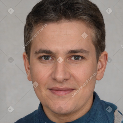 Joyful white adult male with short  brown hair and brown eyes