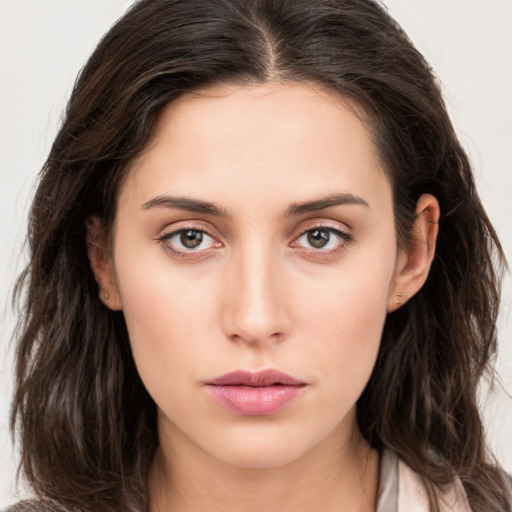 Neutral white young-adult female with long  brown hair and brown eyes