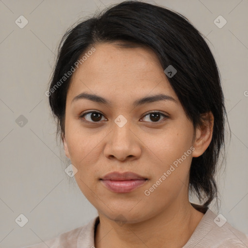 Joyful asian young-adult female with medium  black hair and brown eyes