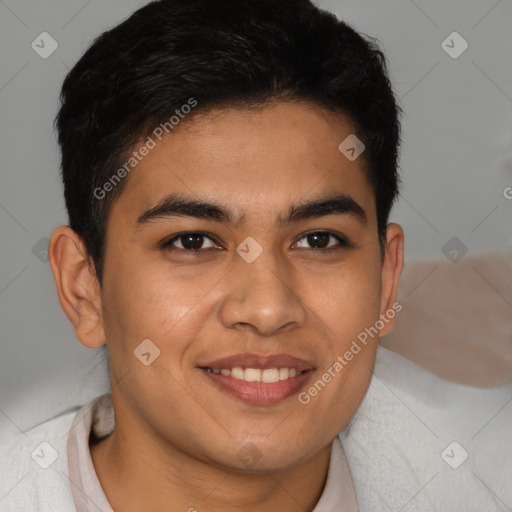 Joyful latino young-adult male with short  brown hair and brown eyes