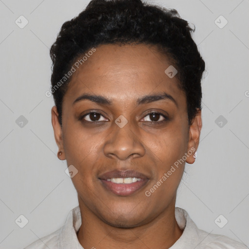 Joyful black young-adult female with short  black hair and brown eyes