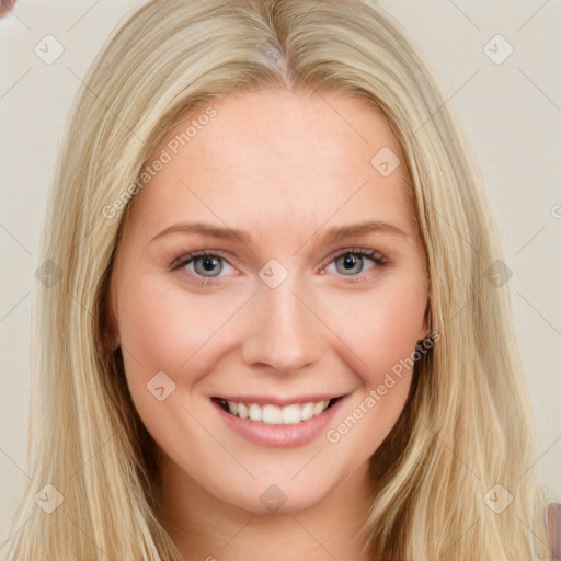 Joyful white young-adult female with long  brown hair and blue eyes