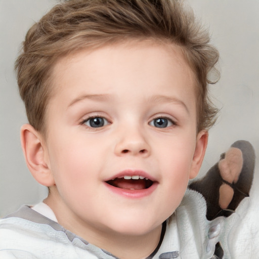 Joyful white child female with short  brown hair and blue eyes